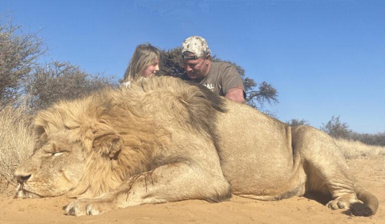 Author Pierre van Wyk and his big game hunting prize, an African lion