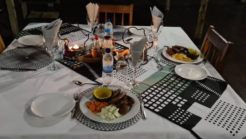 Table with dinner on it.