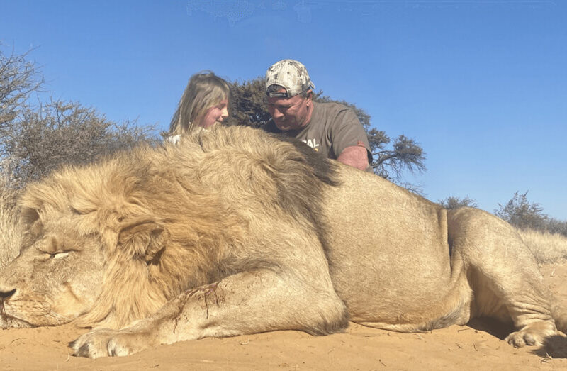Author Pierre van Wyk and his big game hunting prize, an African lion