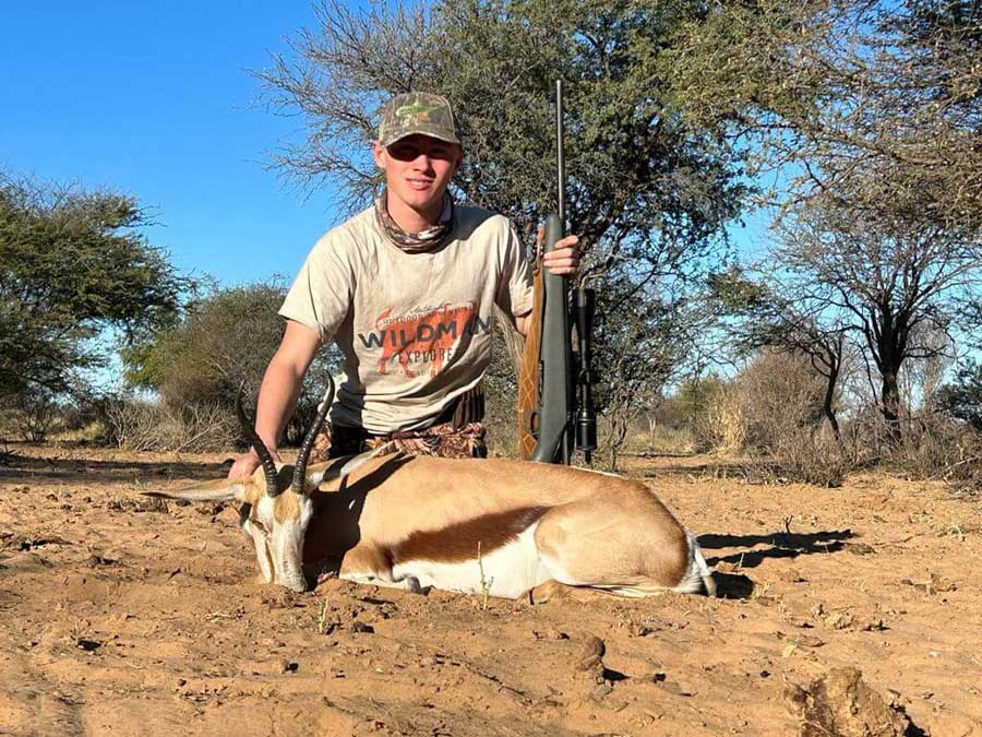 Logan with his springbok trophy, after a successful African plains game hunt